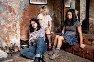 Mary in the junkyard band photo, 2026