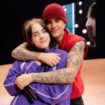 Billie Eilish and Justin Bieber embrace onstage at Coachella 2026, moments after Bieber serenaded her during his weekend two headlining set
