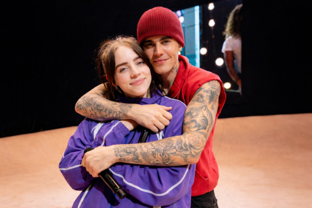 Billie Eilish and Justin Bieber embrace onstage at Coachella 2026, moments after Bieber serenaded her during his weekend two headlining set