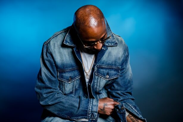 Chicago rapper Don Che in a press photo wearing a denim jacket and gold chain, promoting his new single Cover Charge from Tha Sauce Vol. 2 EP