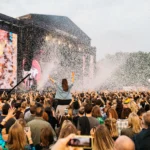 Crowds pack the main stage at Victoria Park, London, during an All Points East festival show — the same AEG-run site where LIDO Festival 2026 has cancelled its June dates due to ground condition concerns.
