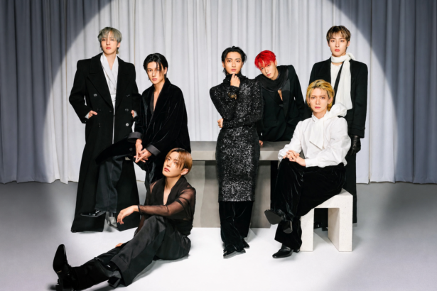 ATEEZ posing for an elegant high-fashion group portrait in black and white outfits during an editorial photoshoot ahead of their BST Hyde Park 2026 UK headline show
