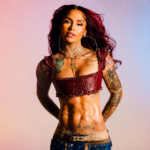 Kehlani in a red corset top and jeans, press photo for her 2026 self-titled album and North America world tour.