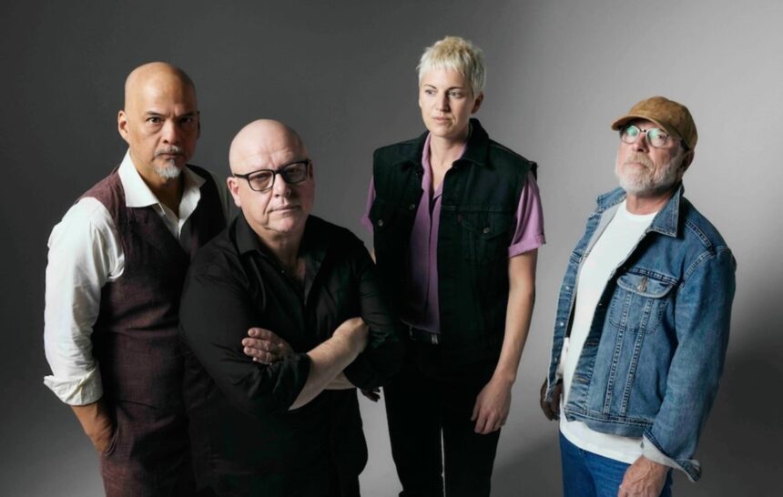 `Pixies photographed in a moody studio portrait against a grey background, featured as part of the Ohana Festival 2026 lineup announcement.`