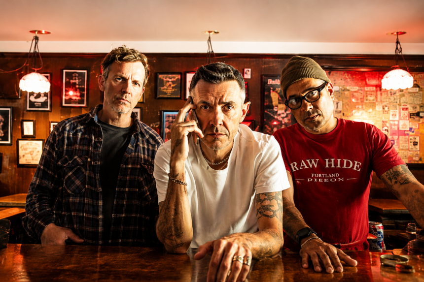 Sparta, photographed by John Carluccio, posed behind a bar for their 'Cut A Silhouette' album campaign.