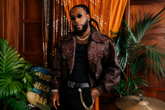 Burna Boy Nigerian Afrobeats artist official press photo for Spotify monthly listeners record 45.79 million 2026