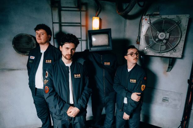 Holding Absence Cardiff post-hardcore band official press photo for Lucid Love single and Modern Life Is Lonely fourth album August 2026