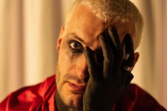 Mazare drum and bass metalcore producer official press photo for Unholy single with IMPVLSE drum and bass metal EP June 2026