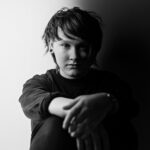 SOAK in a black-and-white portrait.