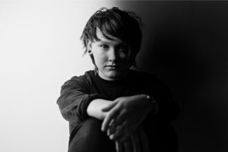 SOAK in a black-and-white portrait.