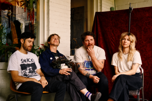 The four members of Atlanta indie rock band Ultra Lights sit together on a porch in a press photo for their debut album 'Pleasure's All Yours.'