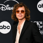 Beck poses on the red carpet ahead of announcing his new album Ride Lonesome, out September 18 via Capitol Records.