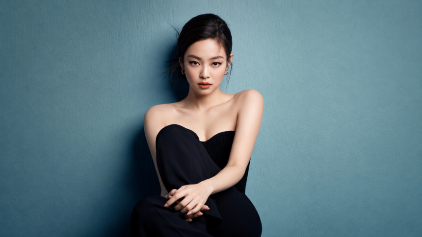 Blackpink's Jennie in a black strapless dress, promoting her single Less Than a Lover
