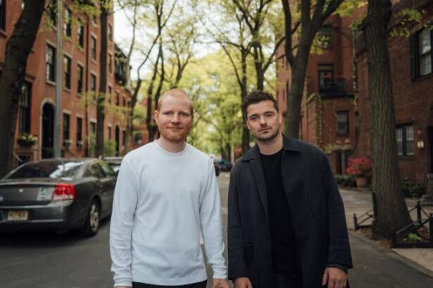 Ed Sheeran and Martin Garrix official press photo for Repeat It collaboration 2026 ahead of Chicago Adler Planetarium wedding surprise Americas Tour