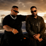 TroyBoi and Morray pose together in a cinematic setting to celebrate their new single, “La La Land
