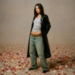 Stella Lefty poses in press art for her debut album 'Long Way Home,' ahead of her 2027 headlining tour.