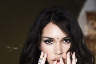 Alysha in a promotional photo for her single 'Take It or Leave It'
