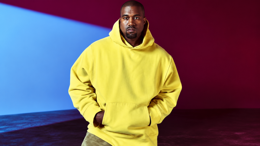 Ye poses in a yellow hoodie on a magazine cover, in an image tied to his 2026 stadium tour dates in Houston, Dallas and Phoenix.