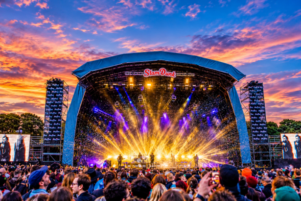 Slam Dunk Festival main stage at sunset, ahead of the 2027 Leeds and Hatfield lineup.