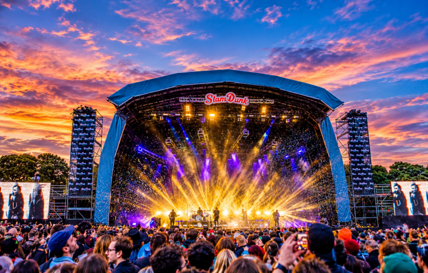 Slam Dunk Festival main stage at sunset, ahead of the 2027 Leeds and Hatfield lineup.